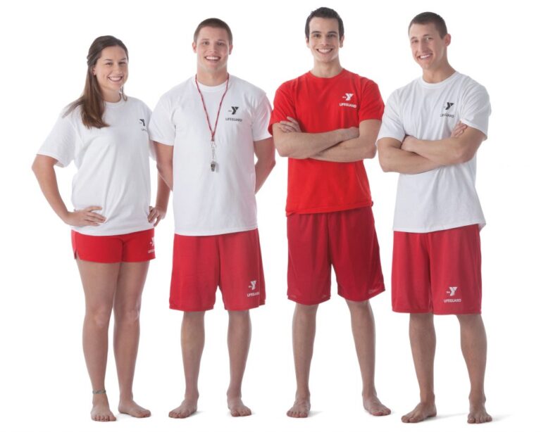 Four lifeguards in coordinated red and white uniforms stand in a row against a white background.